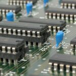 Integration - Black and Blue Electronic Tools on Green Circuit Board