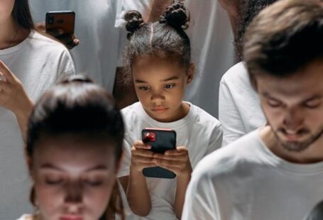 Advances - Photo of People Engaged on their Phones