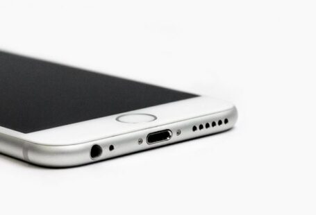 Mobile OS - Close-up of Mobile Phone Against White Background