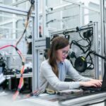 Advances - Photo Of Female Engineer Working On Her Workspace
