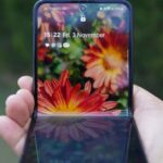 Foldable Phones - Hand with Foldable Smartphone