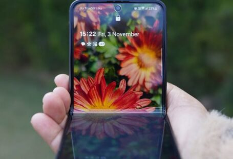 Foldable Phones - Hand with Foldable Smartphone