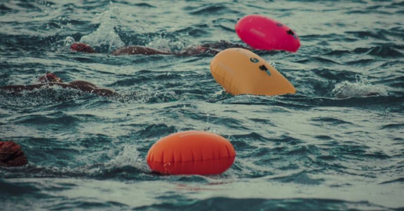 Security Features - Swimmers in the ocean with floating balls