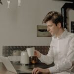 HPC - Woman in White Dress Shirt Sitting on Chair