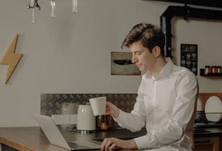 HPC - Woman in White Dress Shirt Sitting on Chair
