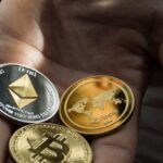 Blockchain - Closeup Photo of Three Round Coins in Person's Palm