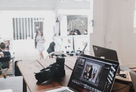 Business Models - Turned-on Gray Laptop Computer on Table