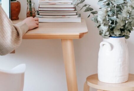 Smart Homes - Anonymous woman working on laptop in room
