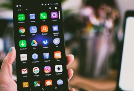 Mobile Apps - Selective Focus Photography of Person Holding Turned on Smartphone